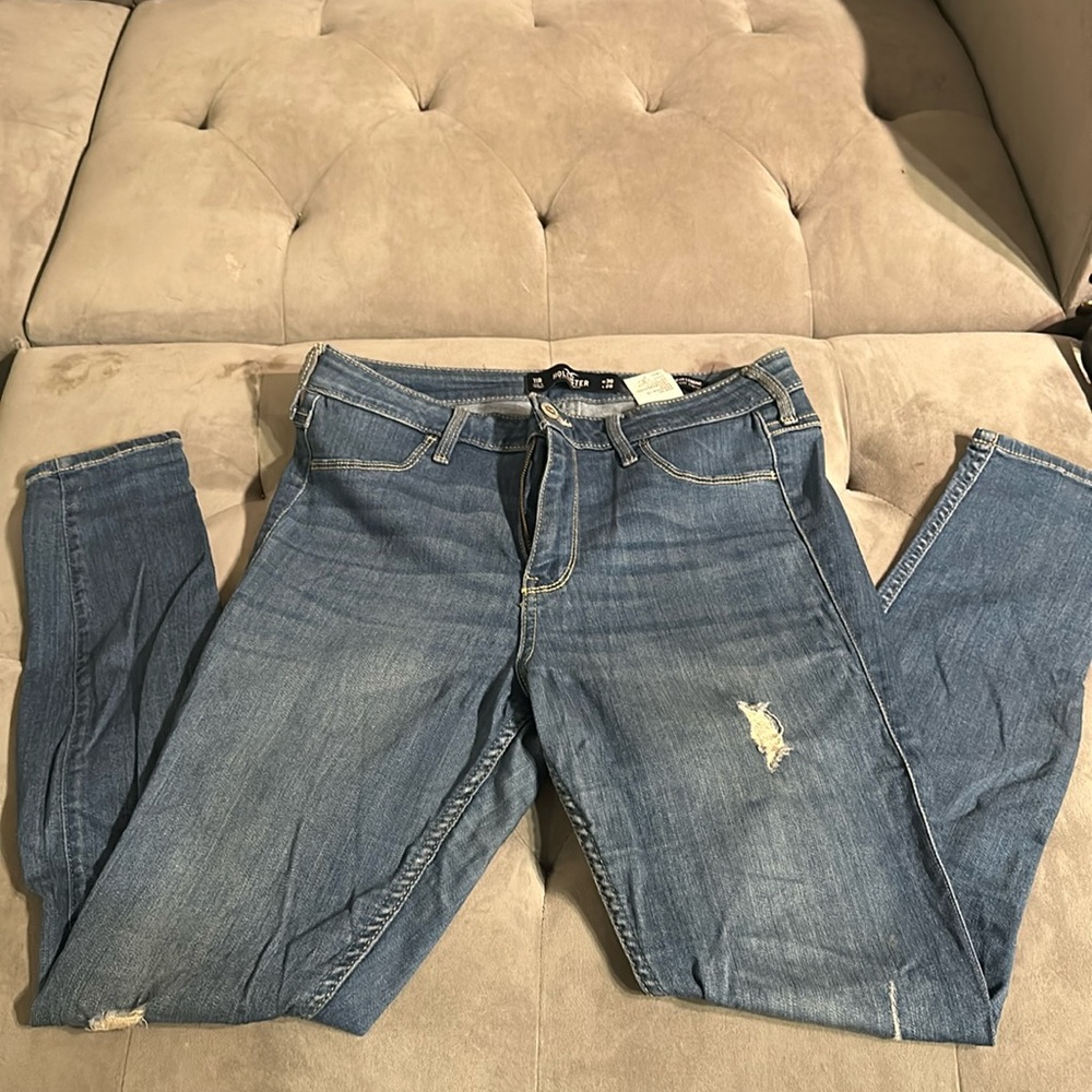 Hollister blue jeans with rips